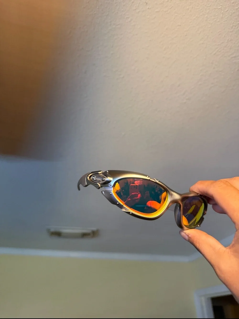 Sporty Mirrored Sunglasses with Orange-Red Lenses Oakleys